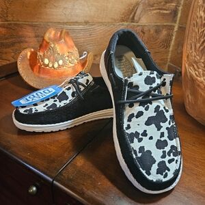 Hey Dude Black and White Cow Print Flats